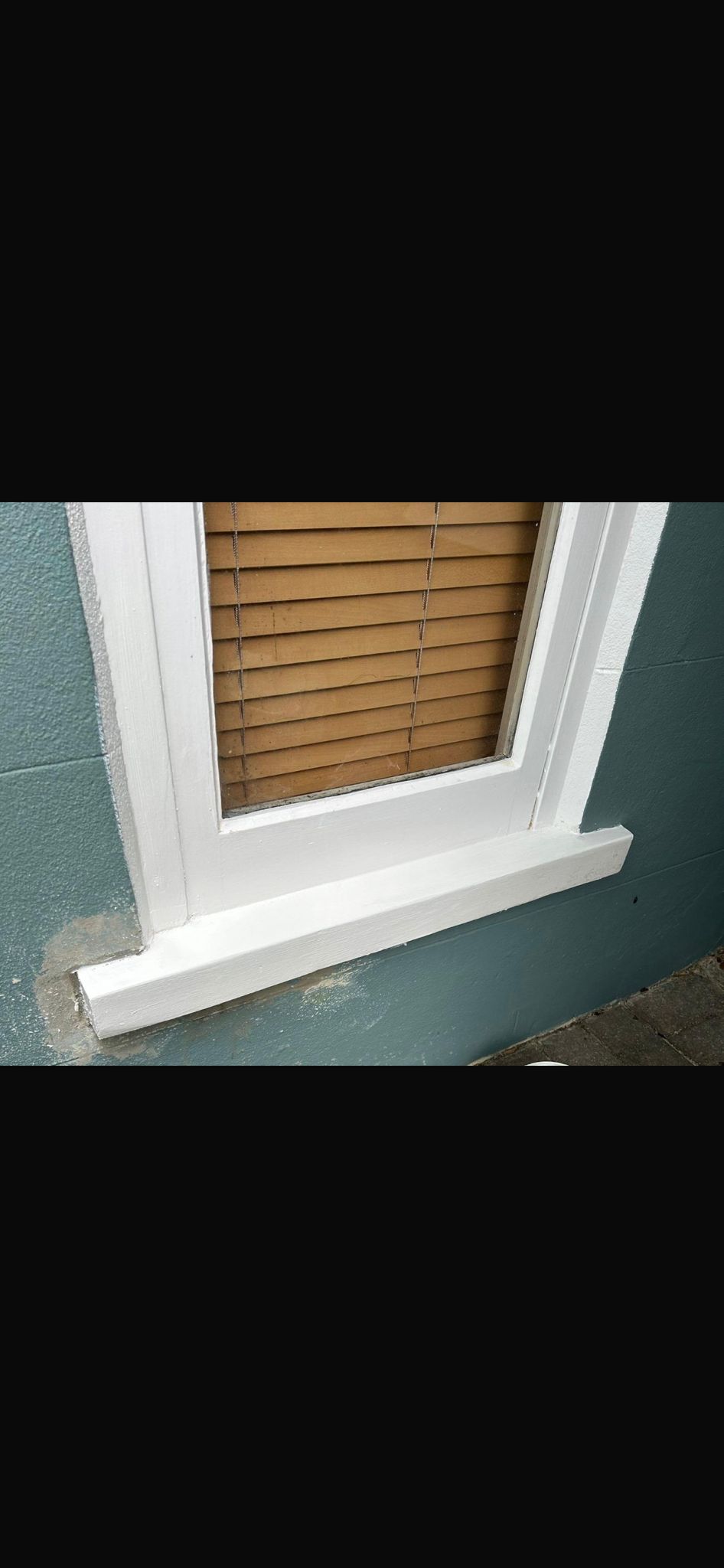New exterior window sill carpentry